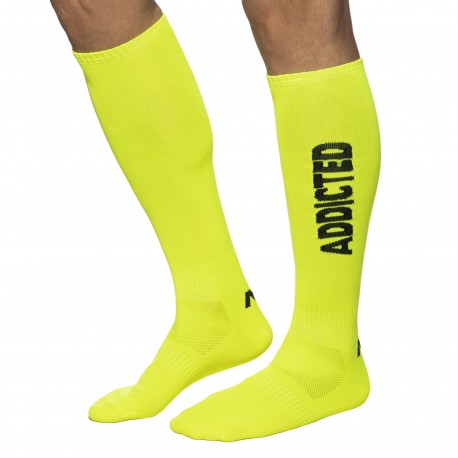 addicted chaussettes hautes neon jaune fluo